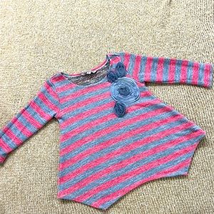 Girls pink and gray striped sweater with flower detail. Asymmetric hemline